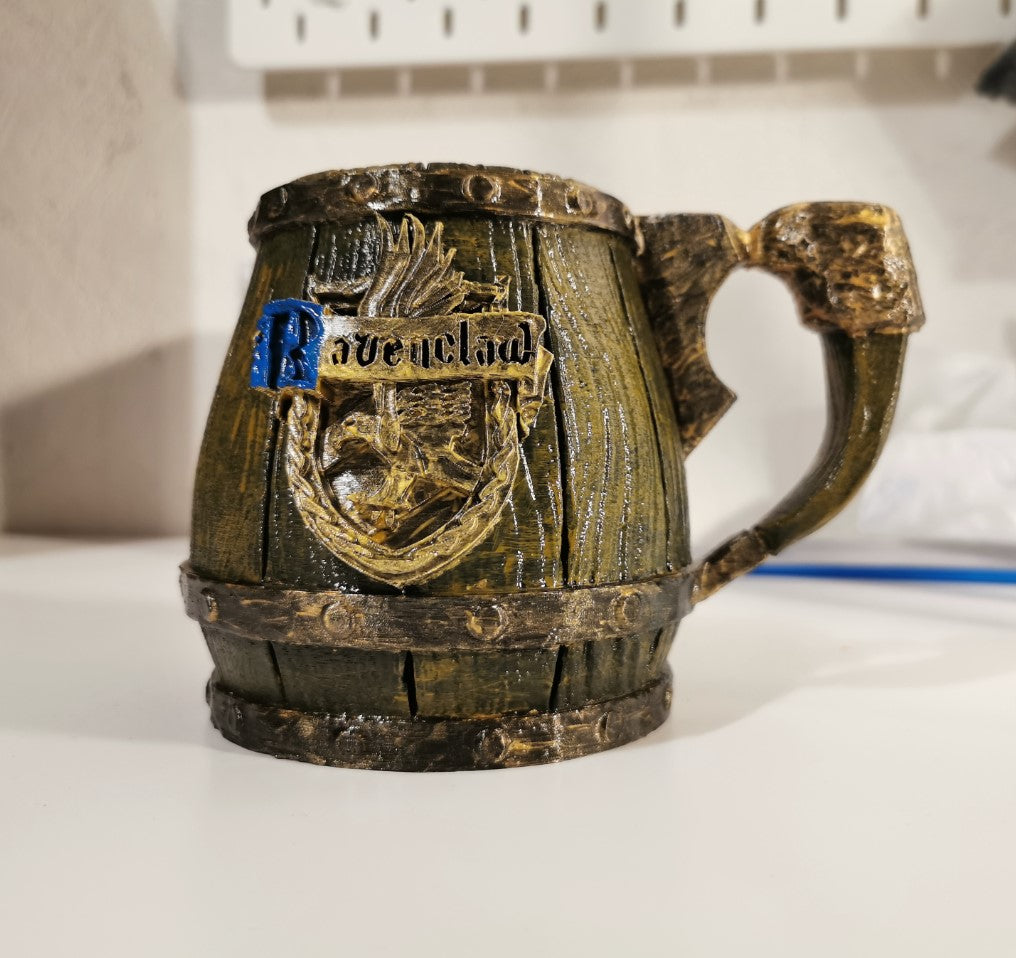 Harry Potter Butterbier-Glas mit Hogwarts Häuser-Logo