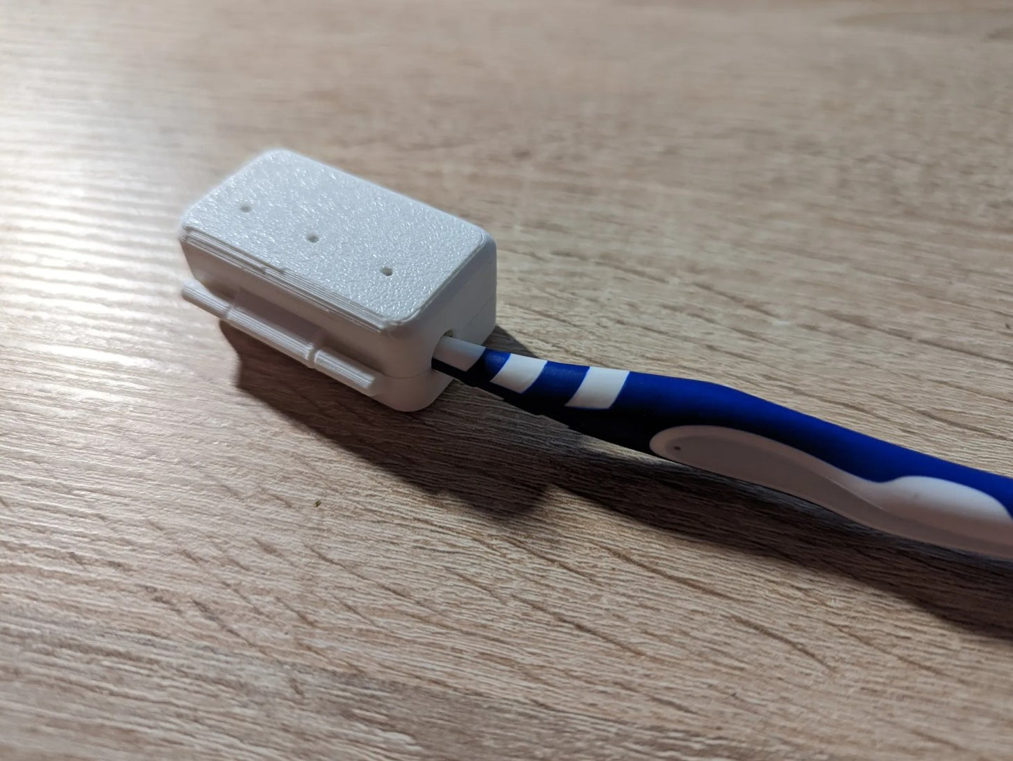 Zahnbürstenkopfbehälter mit Tropfer