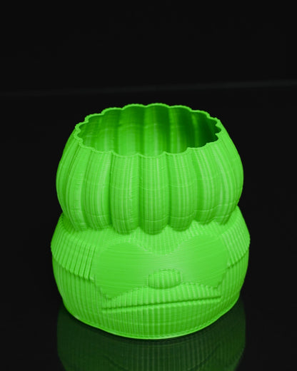 Neongrüne dekorative Blumenvase mit menschlichem Gesicht