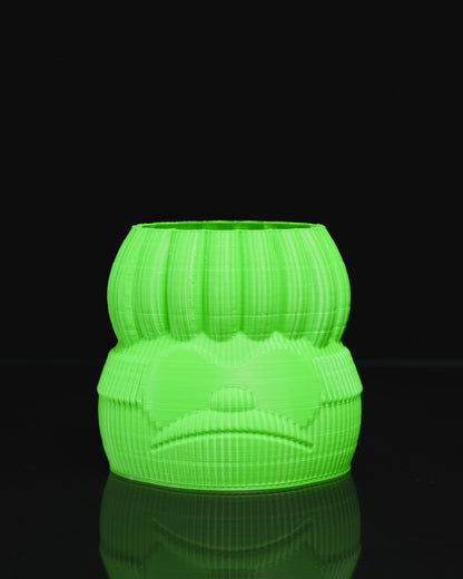 Neongrüne dekorative Blumenvase mit menschlichem Gesicht