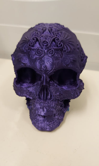 Bestickte Totenkopf-Figur