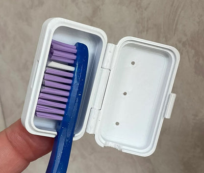 Zahnbürstenkopfbehälter mit Tropfer