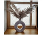 Vase mit Loch in der Mitte