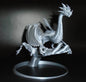 Drachenbaby-Figur in der Hand